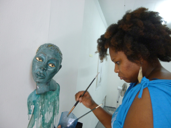 Aisha Tandiwe Bell working in the studio at L'Artocarpe