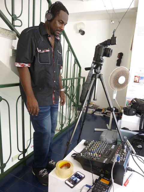 Filmmaker Jean-Yves Adelo recording the interviews.